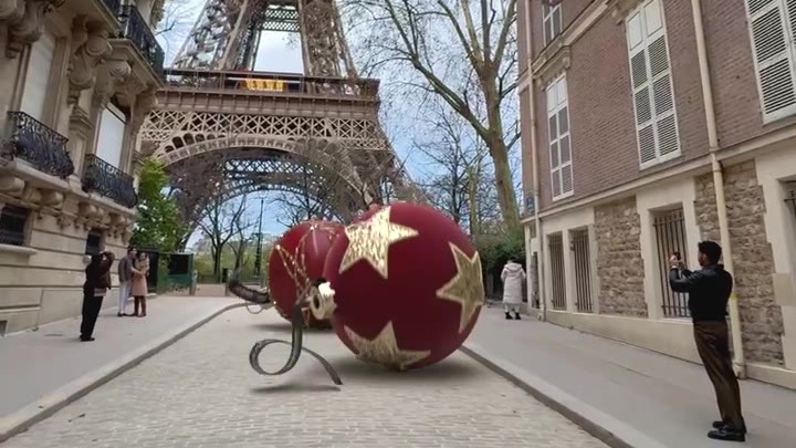 Giant red Christmas baubles by Maisons du Monde at the foot of the Eiffel Tower, Paris (FOOH)