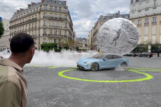 Porsche FOOH: a car bursting out of a giant chrome sphere in a Paris street
